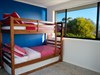 Second bedroom with bunk beds and pull out trundle